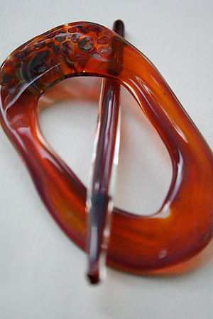 moving mud shawl pins amber monet