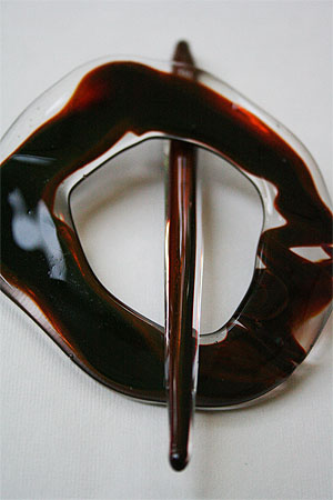 moving mud shawl pin in sunset