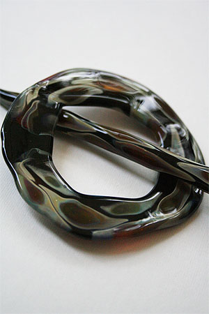moving mud shawl pin in sunset