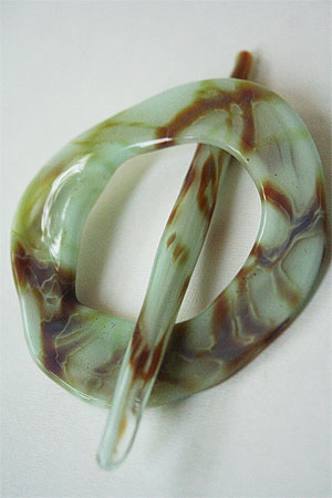 moving mud shawl pin in sunset