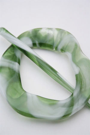 moving mud shawl pin green ribbon
